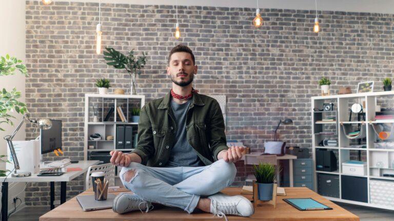 Man practicing mindfulness at work